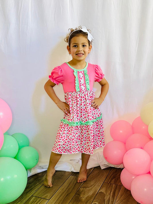 Dress up your little one in this charming pink floral dress, perfect for embracing the joys of childhood. The A-line silhouette provides ease of movement, allowing her to explore the world with confidence and excitement. Let her shine in this casual yet stylish ensemble that promises to capture hearts and create precious memories.